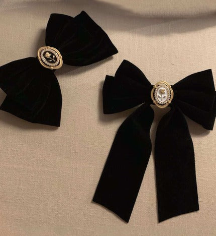 Moños negros de flor